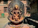 Kathmandu Changu Narayan 24 7C Image Of Vishnu Riding Garuda Just To The North Of Main Entrance To Changu Narayan Temple In the northwest corner of the Changu Narayan Temple in the Kathmandu Valley is a 7C statue of Vishnu riding on the back of Garuda. Vishnu holds a chakra wheel and a long mace club in his raised hands and a conch shell in his lower hand.
